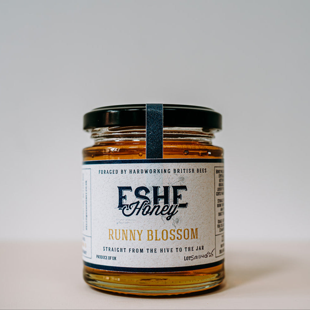 Jar of Eshe Honey with a label on a white background