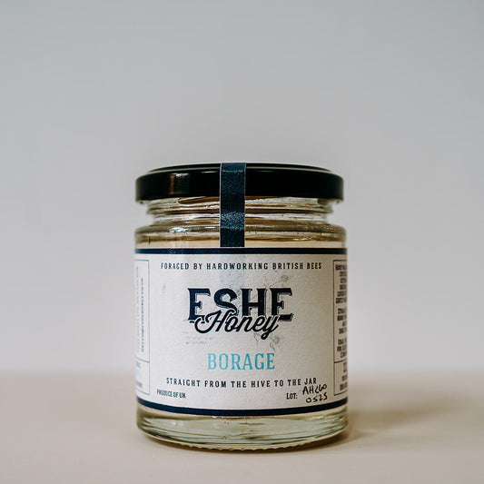 Jar of Eshe Honey on a plain background