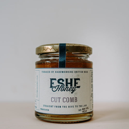 Jar of Eshe Honey on a white background