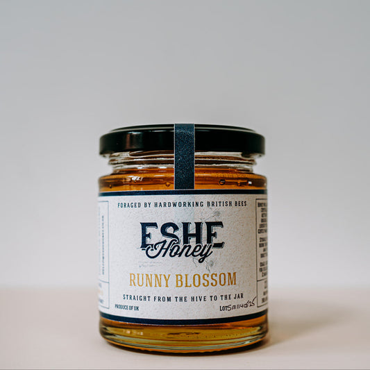 Jar of Eshe Honey with a label on a white background